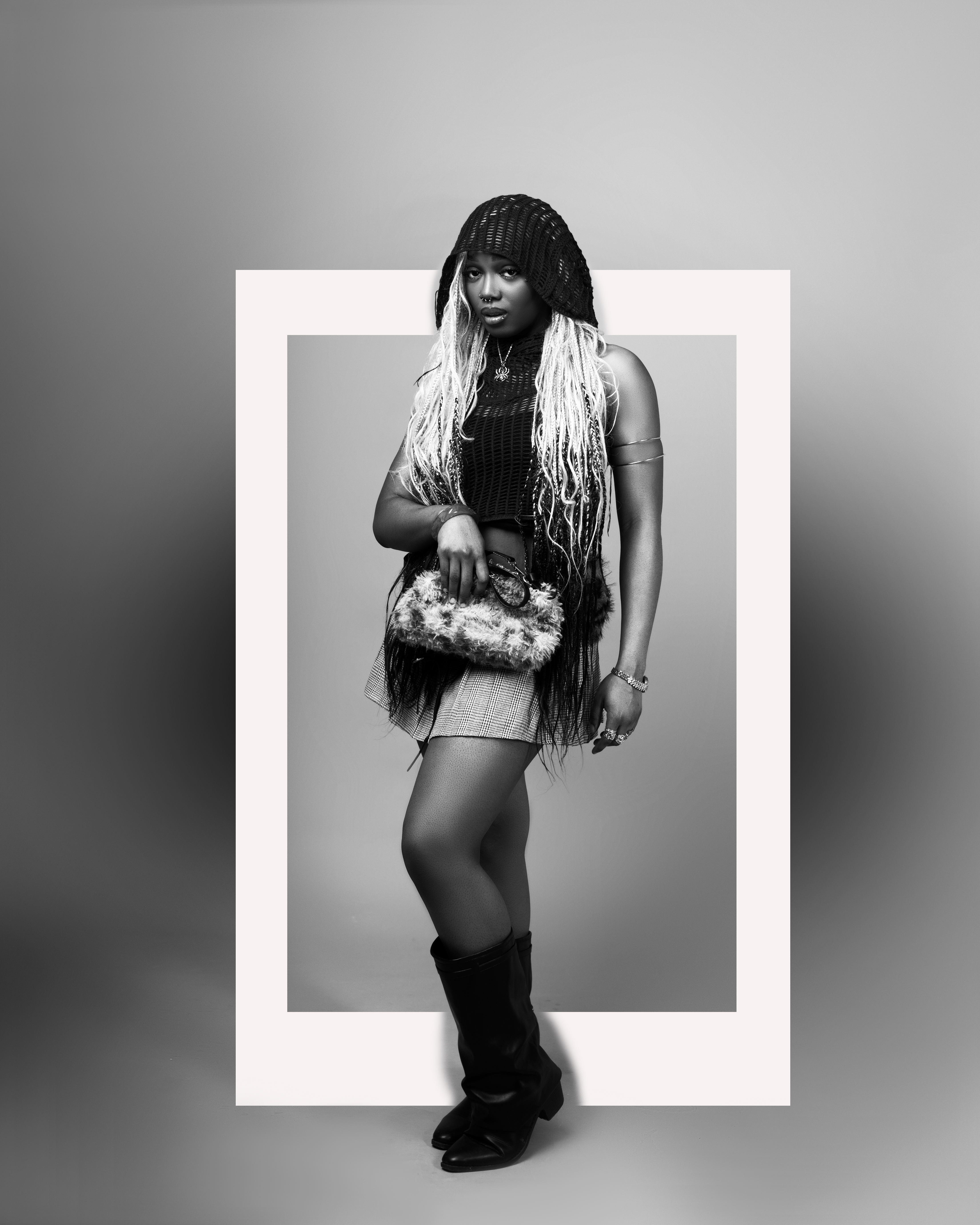 Black and white full-body fashion portrait